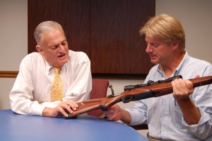 Chairman of the Boardc Alan I. Mossberg and his son, CEO A. Iver Mossberg discus rifle engineering specifications. 