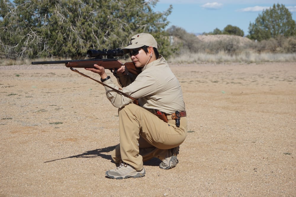 Instructor Il Ling New illustrates the proper supported positions for fast, accurate shooting in the field.